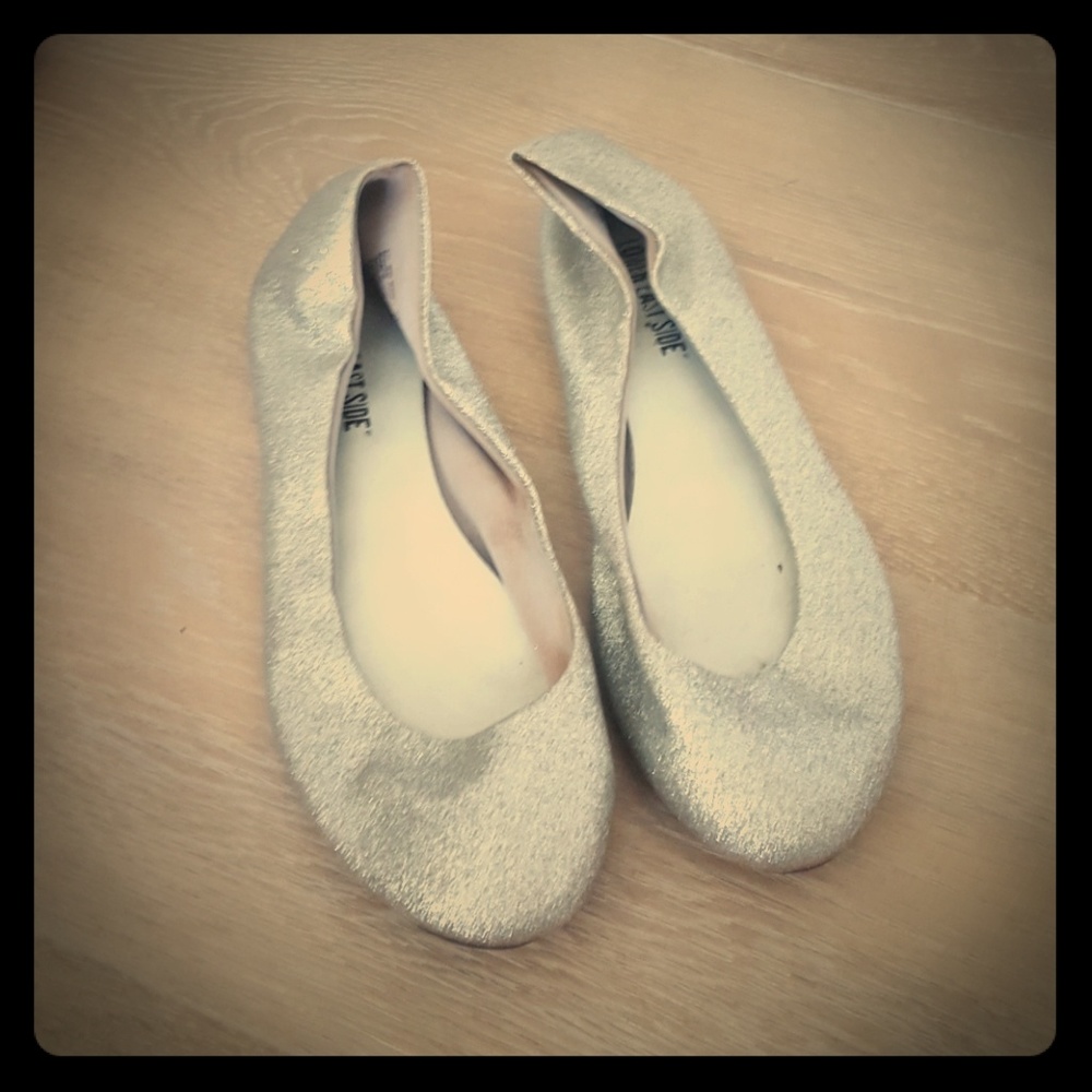 Sparkly silver flat shoes